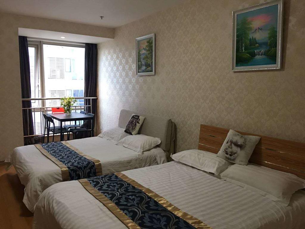 Beijing Tiandi Huadian Hotel Apartment Youlehui Branch מראה חיצוני תמונה